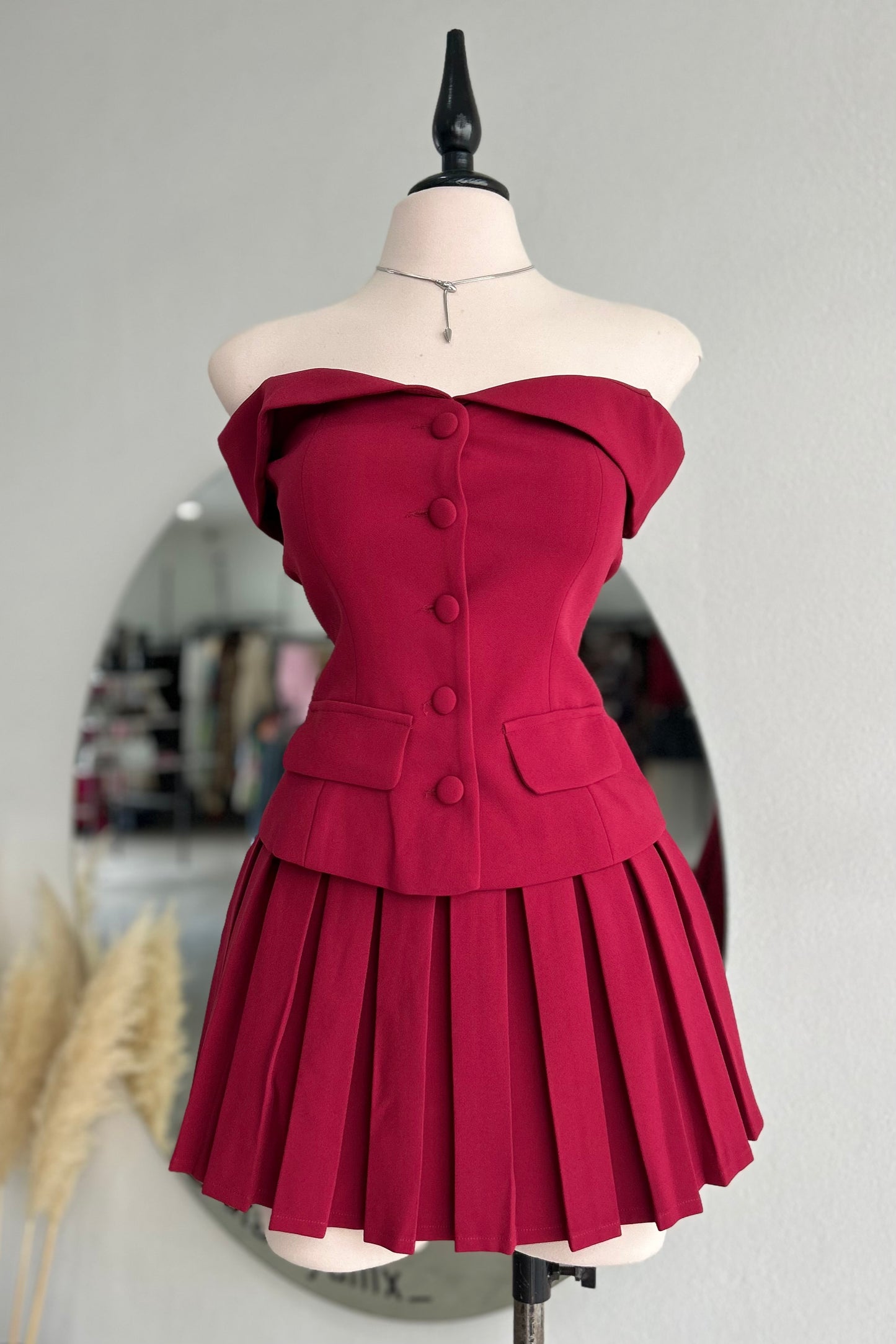 Set tinto falda plisada