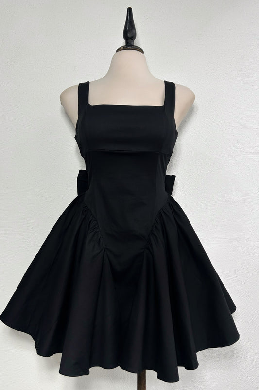 Vestido negro moño espalda