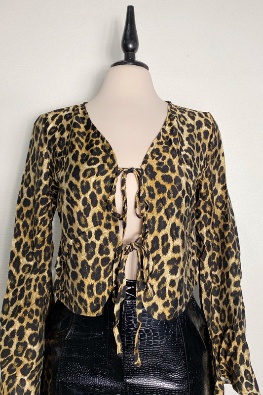 Blusa leopardo manga larga