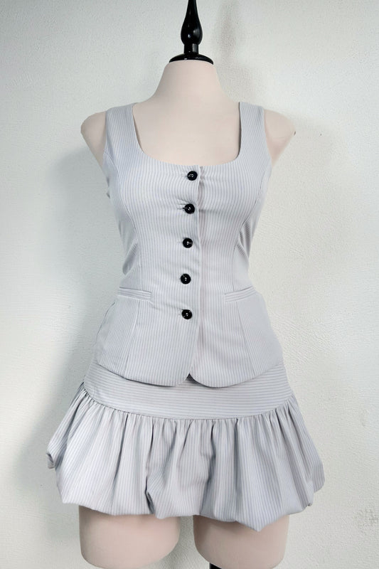 Conjunto chaleco y falda globo gris